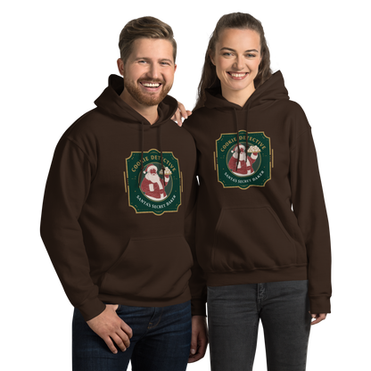 Cookie Detective – Santa’s Secret Baker V1 | Unisex Hoodie Dark Chocolate Apparel > Hoodies & Sweatshirts ZomaModa