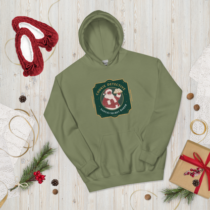 Cookie Detective – Santa’s Secret Baker V1 | Unisex Hoodie Apparel > Hoodies & Sweatshirts ZomaModa